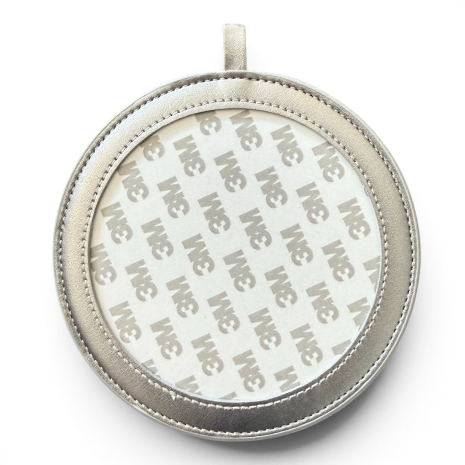 A round silver-toned leather pendant or ornament with a stitched border and 3m adhesive backing, shown on a white background.