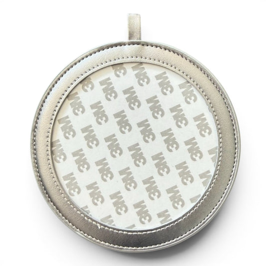 A round silver-toned leather pendant or ornament with a stitched border and 3m adhesive backing, shown on a white background.