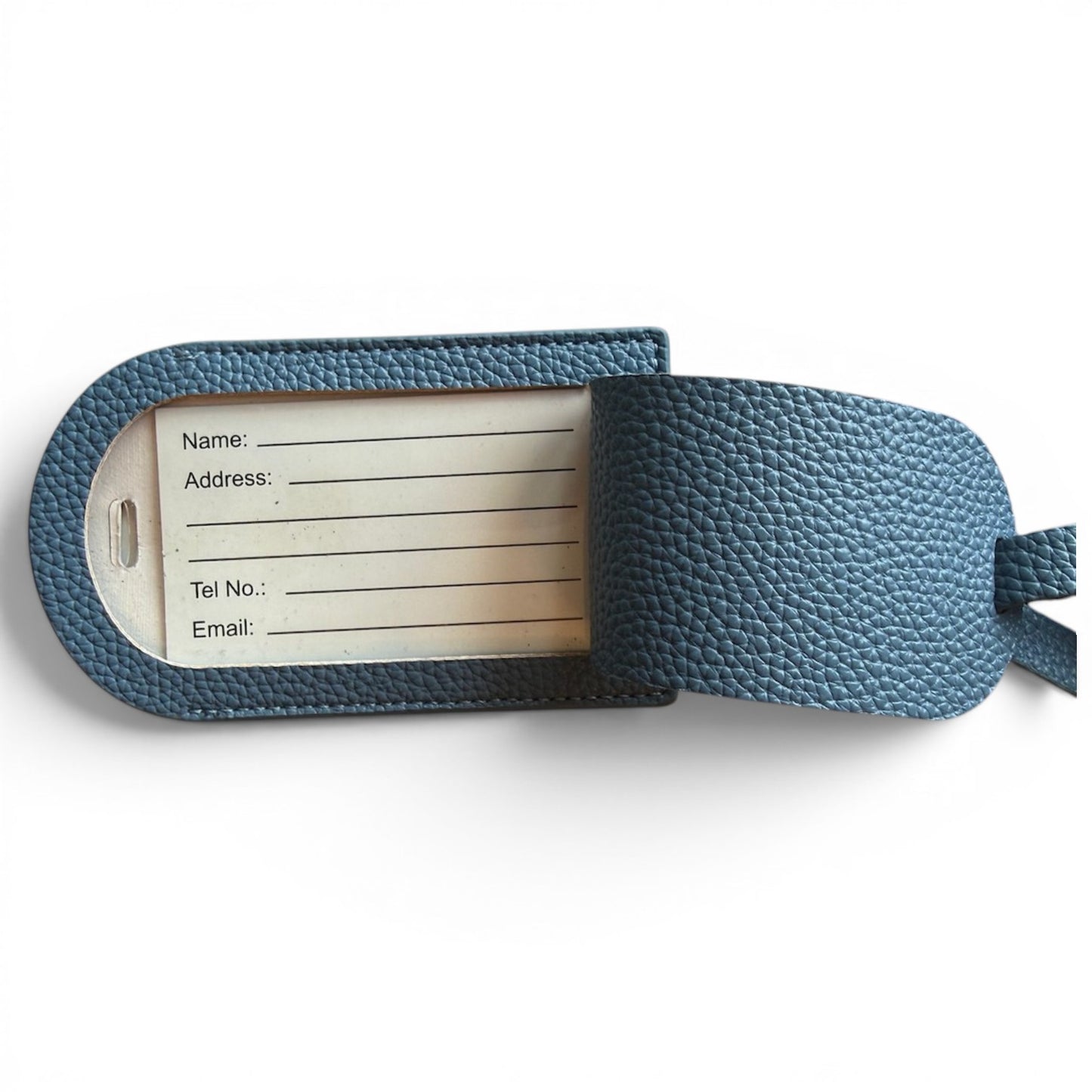 A blue textured leather luggage tag with a pebbled leather strap and a silver metal insert containing fields for name, address, phone number, and email, shown on a white background.
