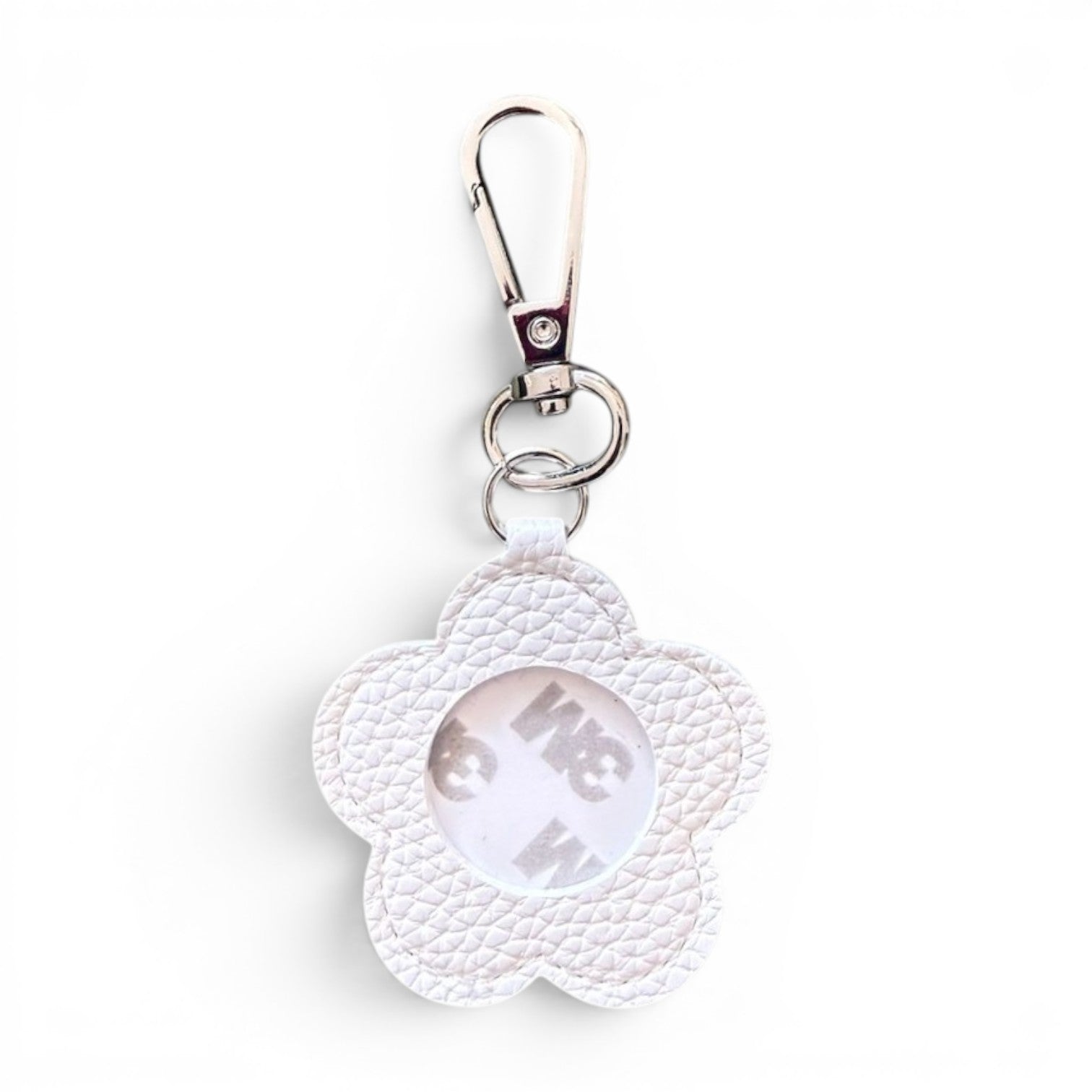 A white textured faux-leather flower-shaped keychain with a silver metal clasp and a 3m adhesive circular center, shown on a plain white background.