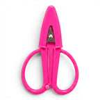 G&A Canvas Co Super Snip mini thread scissors in bright fuchsia with an integrated protective silicone sleeve.