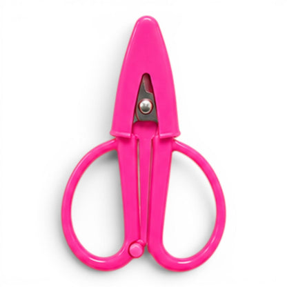 G&A Canvas Co Super Snip mini thread scissors in bright fuchsia with an integrated protective silicone sleeve.
